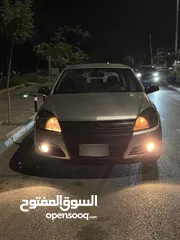  12 اوبل استرا 2005