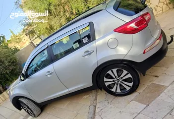  4 جيب كيا سبورتاج بحالة ممتازة يشمل كافة الإضافات عدا الفتحة