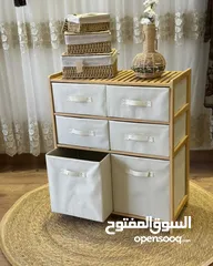  2 مع خزانة البامبو  بـ6 أدراج قماشية متينة تصميم طبيعي وراقي يناسب جميع الديكورات .