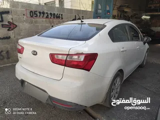  2 كيا ريو/ترخيص 2014/جير عادي  فحص كراتين/شمامه بنزين