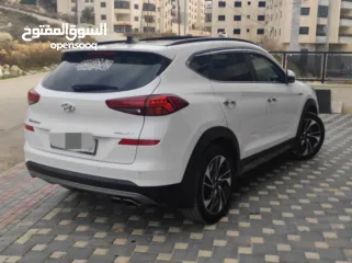  7 هونداي توسان فل الفل اضافات دهان شركة وعداد أصلي 70000كم فقططط رخصة وتأمين شامل للبيع بسعر مغري