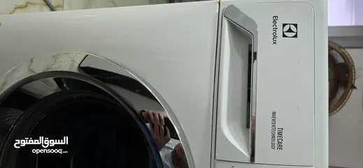  4 غسالة الكترولكس لون ابيض 8 كلو
