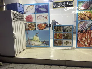  2 محل بيع وشوي الأسماك