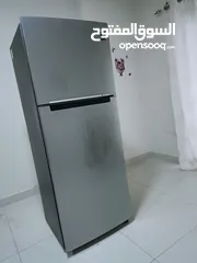  8 Slightly used Samsung Refrigerator with additional features.