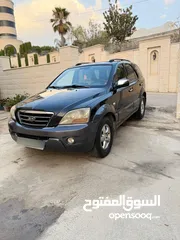  2 جيب كيا سرنتو موديل 2009 خالي من الضربات موتور وقير الف افحص وين بدك