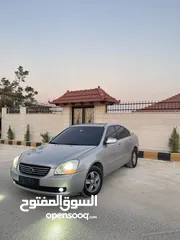  2 كيا لوتزي 2006 3 جيد لون سلفر ماتور 2000cc