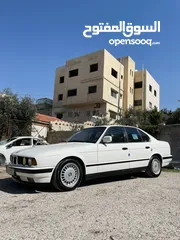  23 للبيع بحالة الوكالة BMW 520i موديل 1989 جير عادي تبارك الرحمن