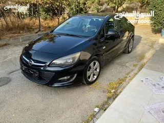  2 اوبل استرا 2014 ماتور 1400  بحاله جيده لون اسود والدفع نقدي