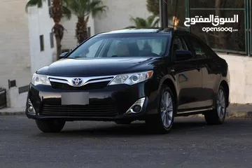  1 تويوتا كامري لون كحلي مميز موديل 2014 للبيع بحالة مممتازة لا تحتاج لأي نوع من الصيانة