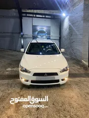  9 ميتسوبيشي لانسر فراشه موديل 2015  بحاله جيده للبيع بداعي السفر