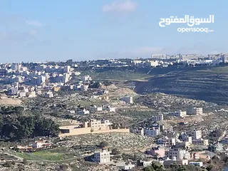  5 ارض مميزة 700 متر في ابو نعير ذات اطلاه عاليه على مسجد الحدائق وابراج السادس تبعد عن دوار الشعب 10د