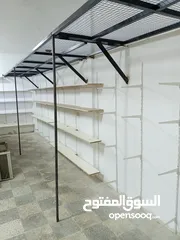  1 رفوف  محل سوبر ماركة ابواب