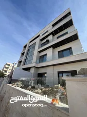  19 اخر شقة ارضية استثمارية 100 متر مقسمة الى استديو عدد 2 في ضاحية الرشيد خلف الجامعة الاردنية مباشرة