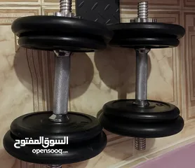  1 طقم دامبلز مع قضبان جديد الوزن الكلي 15 كغم بدون القضبان 4 دامبلز × 2.5 كغم 4 دامبلز × 1.25 كغم