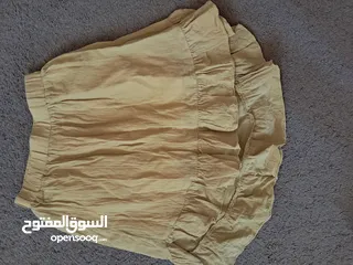  14 ملابس عدة ماركات يوجد قطع جديدة من عمر 7 الى 10 تقريبا