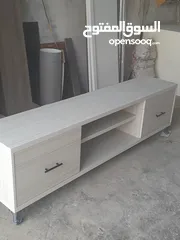  2 طاولات شاشه ديكورات داخلي خشب لامنيت 18م الون حسب الطلب الون حسب الطلب كفاله 5سنوات على اعمالنا