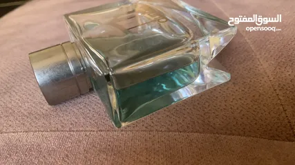  7 عطر دنهل بلاك فارغ نصفه فقط