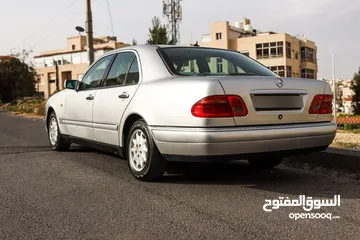  13 مرسيدس E200  موديل 1999 فل مع فتحة