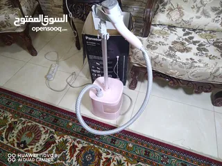  2 مكواة بخار  عاموديه
