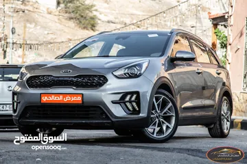  1 Kia Niro 2020  السيارة مميزة جدا و قطعت مسافة 100,000 كيلو متر فقط