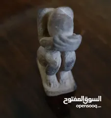  1 Handmade 150 years ago, carved in the shape of a Jewish prisoner = final price 10,000 dinars