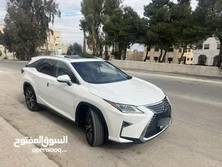  6 لكزس RX450hL موديل 2018 لون ابيض لؤلؤي وارد وصيانه الوكاله اعلى تصنيف من فئتها