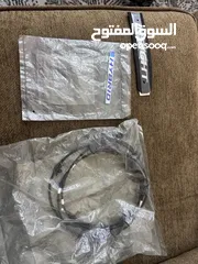  2 قطع هوندا انسايت (دلايات خلفي ، كيبل صندوق ، فصالات غطاء خلفي ،شعار هايبرد، شعار انسايت) اصلي وكاله