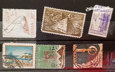  23 طوابع اصلية من كل بلدان العالم للبيع المستعجل الطابع ب دينار
