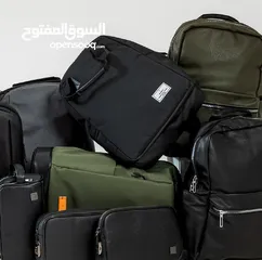  14 شنطة جلد من براند (WIWU) ضد المياه بكفالة الوكيل الحصري وتوصيل مجاني داخل عمان