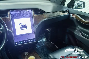  12 Tesla Model X Standard Range  2019   السيارة بحالة ممتازة جدا و قطعت مسافة 51,000 كيلو متر فقط