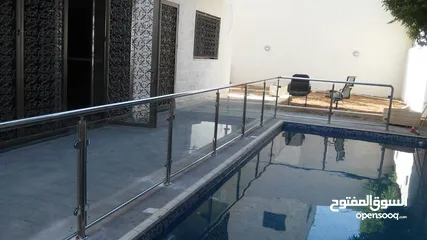  14 قطعة ارض 716م2 عليها عمارة اربعة طوابق وقبو في الصويفية