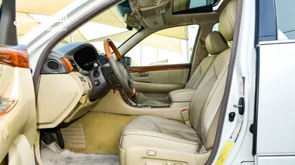  8 لكزس LS430 وارد 1/2 الترا موديل 2006 لون أبيض فتحة جلد رنجات خشب مرايا كهرباء بحالة ممتازة