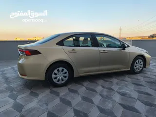  10 تويوتا كورولا 2021 لون شمباني بنزين اصلي ماتور cc1600 فحص كامل جمرك حديث