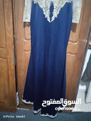  6 فستان سهرة كحلي ودهبي طويل