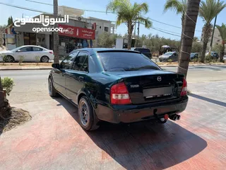  13 مازدا323للبيع