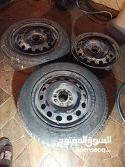  2 جنط لانسر حديد 14 برغي بعيد عدد 3