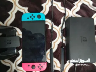  2 NINTENDO SWITCH OLED