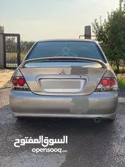  4 لانسر قير عادي متور 1300 فحص 2 جيد