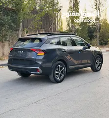  2 كيا سبورتاج هايبرد 2023 فل كامل مع بانوراما - باللون المميز والداخلية المميزة - والسعر المميز