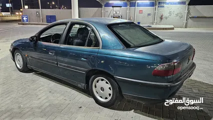  6 اوبل اوميجا للبيع السياره ب حاجه ل صيانه (القير + صنوبرصات) كاوشك جديد كراسي كهرباء السياره فحص خالي