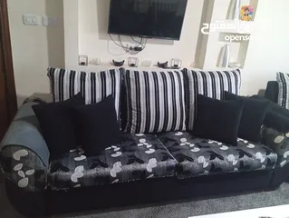  7 طقم كنب لون سكني واسود