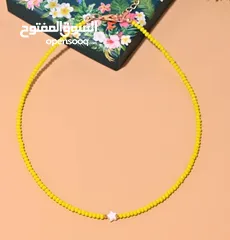  4 Accessoires N  سناسل خرز