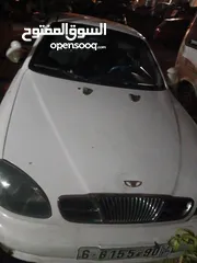  2 دايو لانوس نظيفة 2001 لونها أبيض للبيع