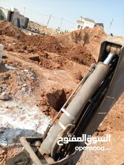  11 حفارة/ جرافة جي سي بي