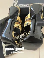  4 Versace sandals with heel