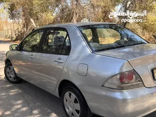 4 متسوبيشي لانسر 2005 محرك 1600