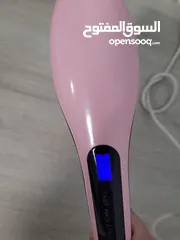  2 مكواه شعر حراريه عل شكل مشط................................................ .    ....   .......  .