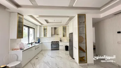  2 في أجمل مناطق الرابيه شقة أرضيه 196م مع ترس 50م بتشطيبات راقية / ref 9547
