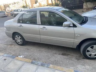  2 ميتسوبيشي لانسر موديل 2010 محرك 1300 سي سي ..الفحص مرفق بالصور
