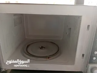  5 ميكرويف مع فرن حجم كبير/شغال 100/100لون سلفر للبيع المستعجل